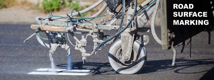 Machine Painting Lane Markers on Highway